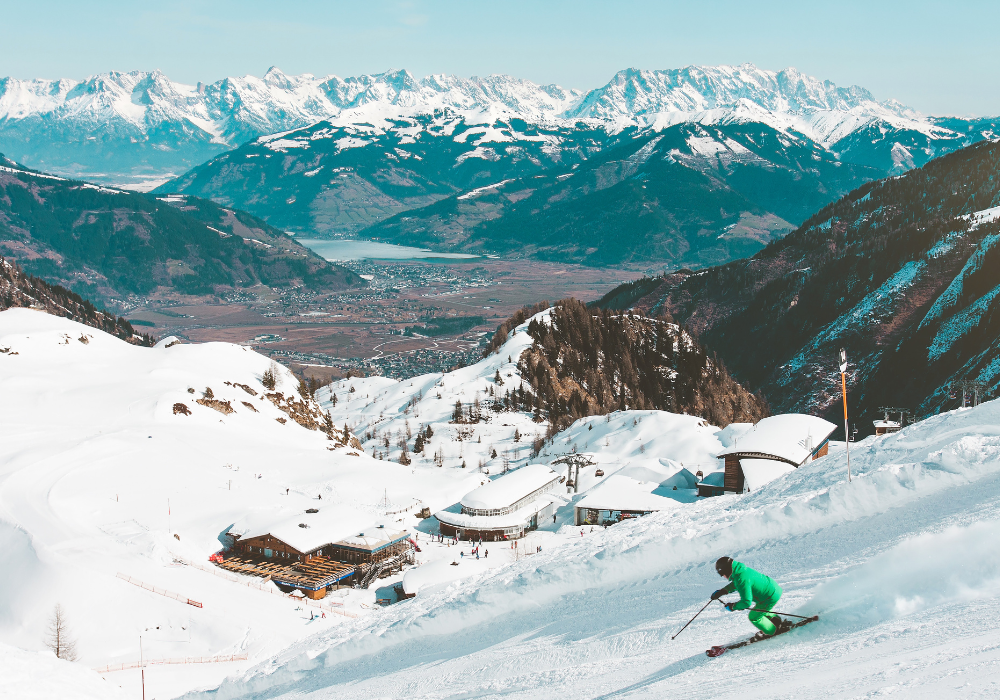 a snowboarder snowboarding on a mountain